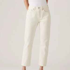 Levi’s off white button fly straight leg jeans.